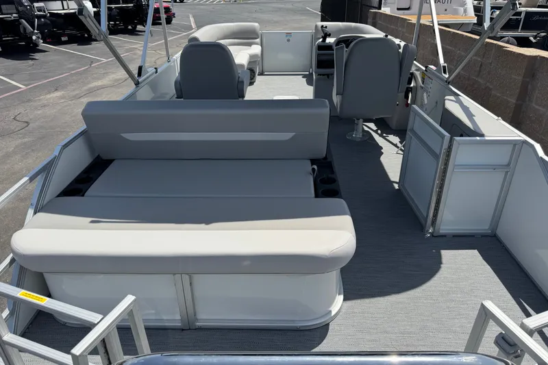 Slide: The Image of 2027 Godfrey Xperience 2286 Flip Lounge pontoon boat interior with spacious seating. - 14