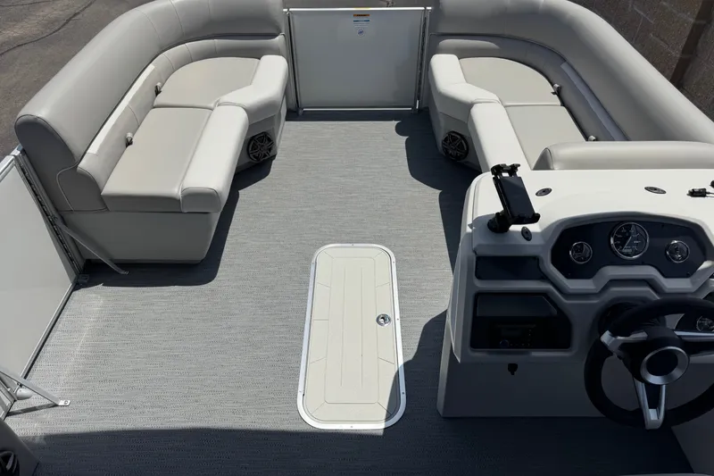 Slide: The Image of 2027 Godfrey Xperience 2286 Flip Lounge interior with plush seating and modern dashboard. - 11