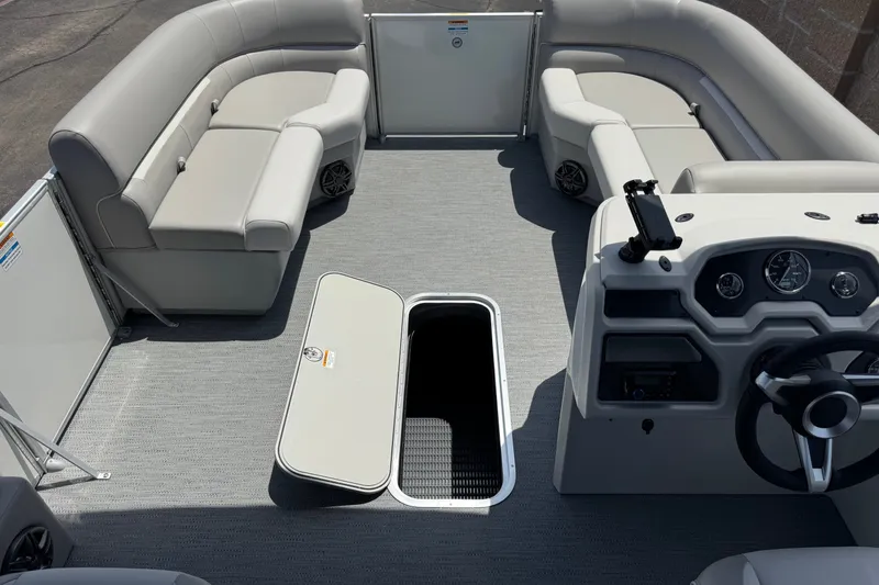 Slide: The Image of 2027 Godfrey Xperience 2286 Flip Lounge interior with plush seating and modern dashboard. - 12