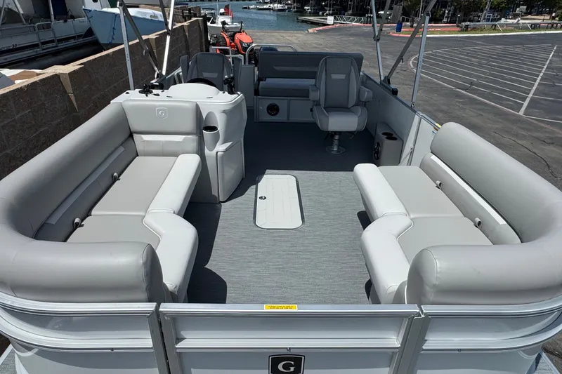 Slide: The Image of 2027 Godfrey Xperience 2286 Flip Lounge pontoon boat with spacious seating and modern design. - 5