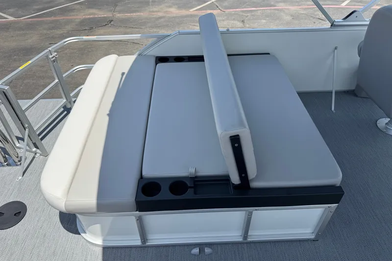 Slide: The Image of 2027 Godfrey Xperience 2286 Flip Lounge boat seating with cup holders, gray upholstery. - 16
