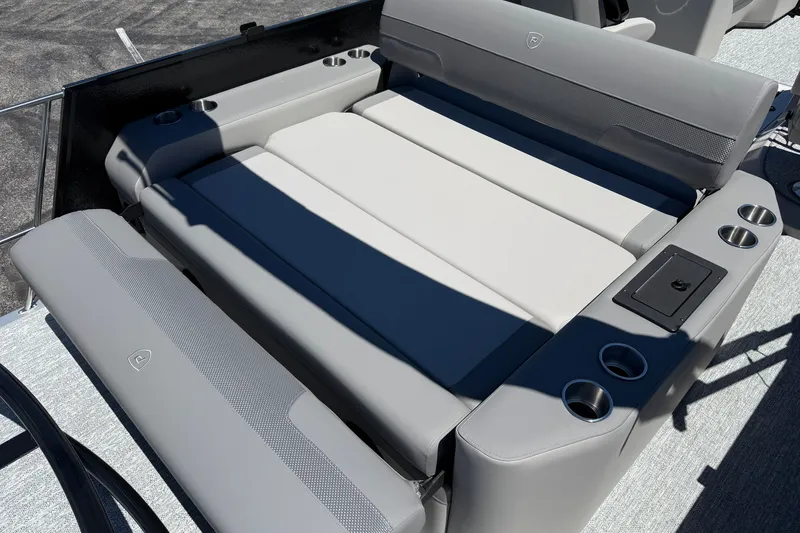 Slide: The Image of Luxurious seating on 2026 Premier 230 Sunsation RL pontoon boat with cup holders. - 32