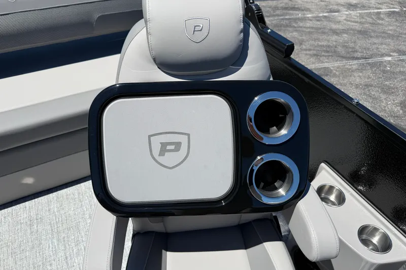 Slide: The Image of Premier 230 Sunsation RL 2026 boat seat with cup holders and logo detail. - 29