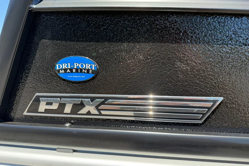 Slide: The Image of 2026 Premier 230 Sunsation RL boat with Dri-Port Marine and PTX logos. - 7