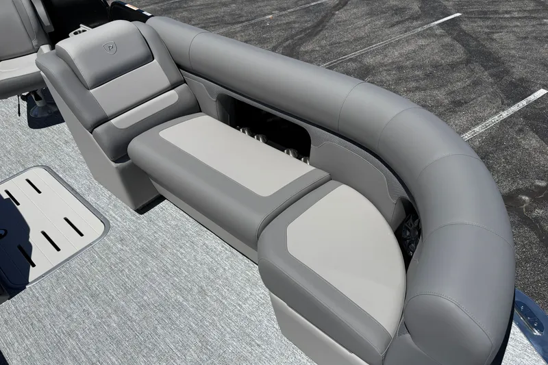 Slide: The Image of Premier 230 Sunsation RL 2026 boat interior with sleek gray seating and modern design. - 15
