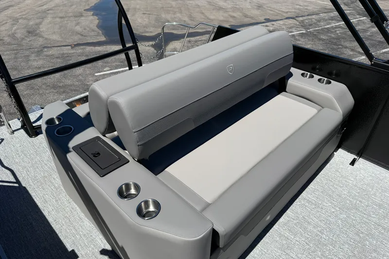 Slide: The Image of 2026 Premier 230 Sunsation RL boat seating with cup holders and sleek design. - 30