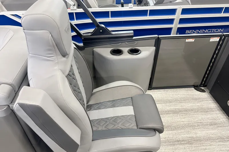 Slide: The Image of Luxurious seating on the 2027 Bennington 24 M Open Fastback Quad Bench pontoon boat. - 13