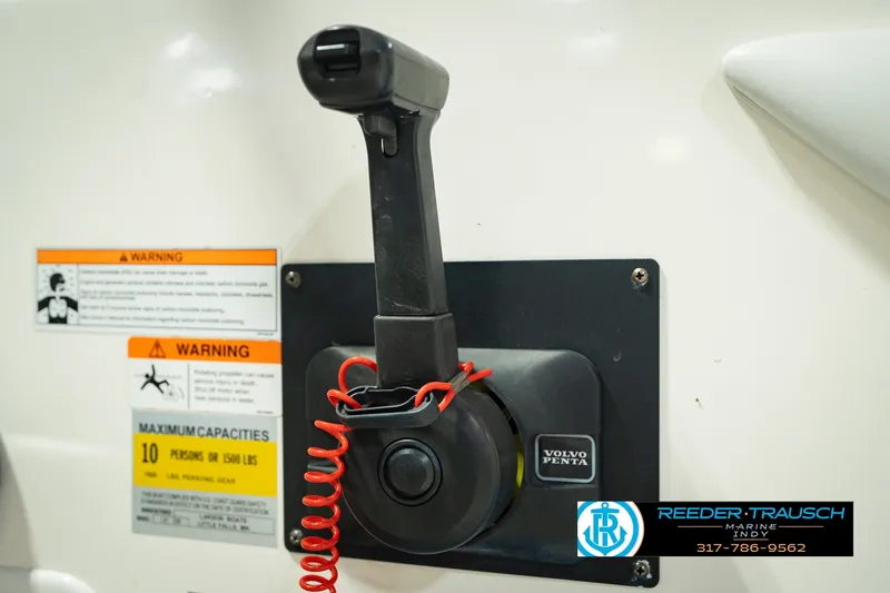 Slide: The Image of Close-up of Volvo Penta throttle control on 2007 Larson LXi 228 Wakeboard Edition boat. - 43