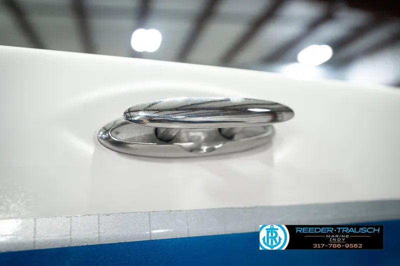Slide: The Image of Close-up of a 2007 Larson LXi 228 Wakeboard Edition boat cleat. - 63