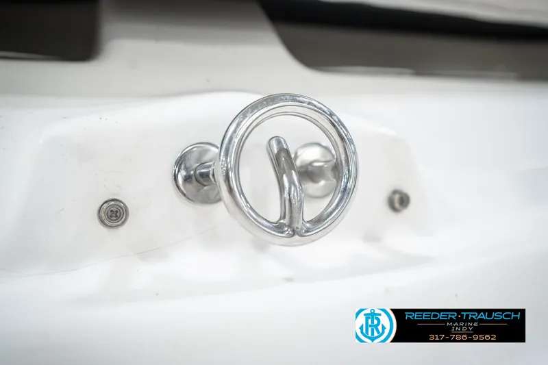 Slide: The Image of Close-up of a 2007 Larson LXi 228 Wakeboard Edition boat cleat. - 64