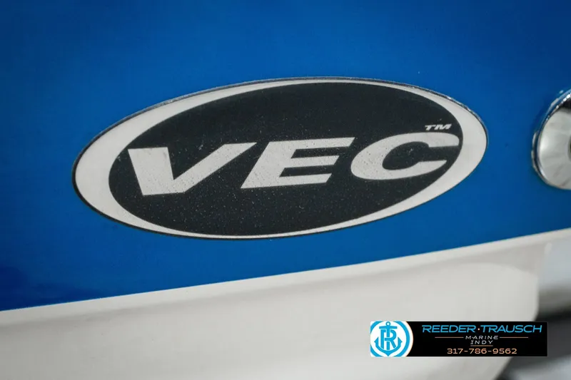 Slide: The Image of 2007 Larson LXi 228 Wakeboard Edition with VEC logo on blue background. - 58
