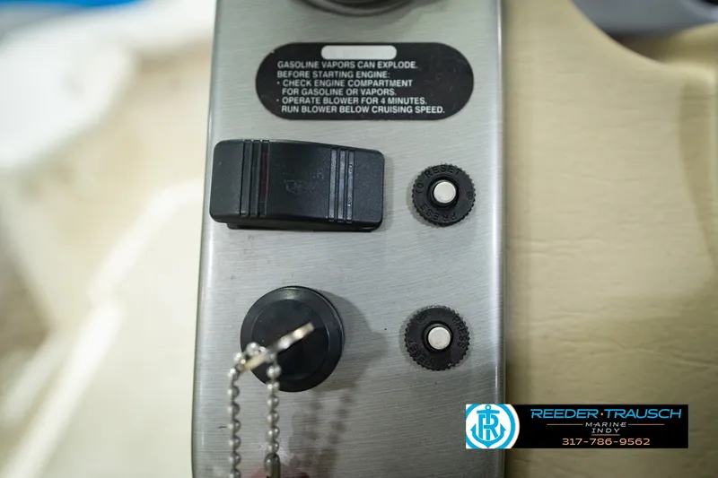 Slide: The Image of Close-up of 2007 Larson LXi 228 Wakeboard Edition control panel with safety instructions. - 35