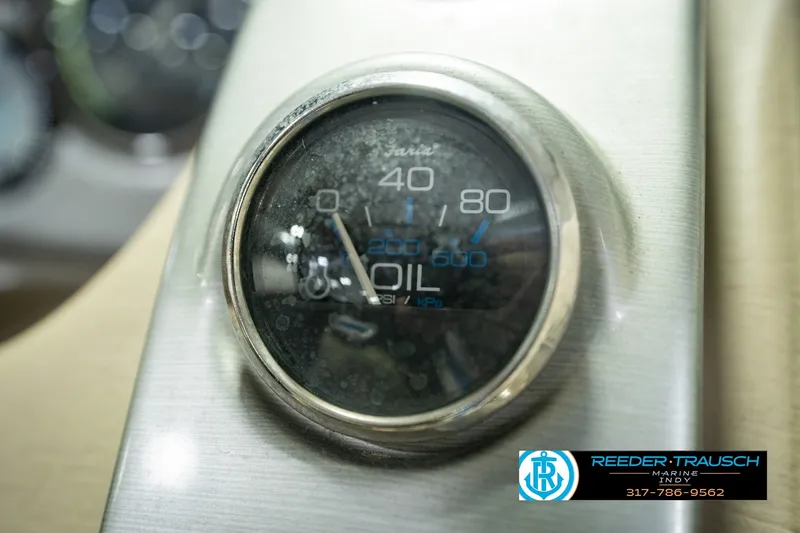 Slide: The Image of Close-up of oil pressure gauge on 2007 Larson LXi 228 Wakeboard Edition boat dashboard. - 40