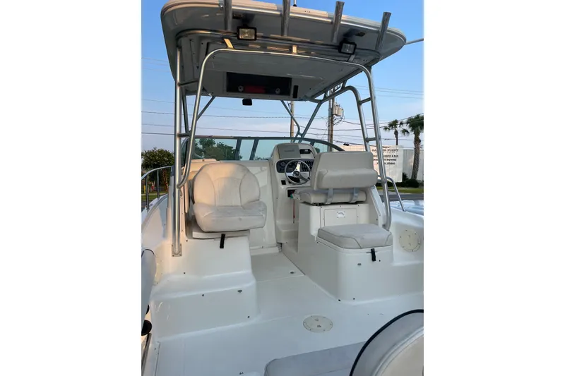 Slide: The Image of 2007 Robalo R265 Walkaround boat interior with seating and helm station. - 15