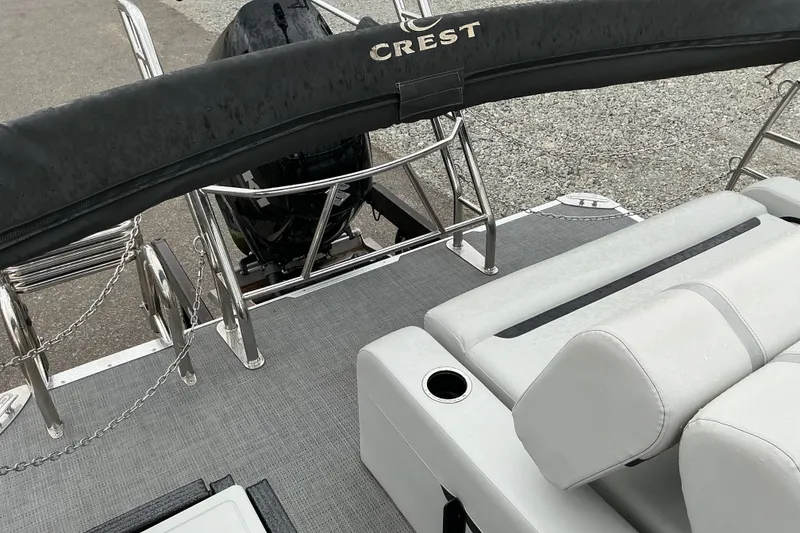 Slide: The Image of 2023 Crest Classic DLX 220 boat with sleek seating and modern design. - 10