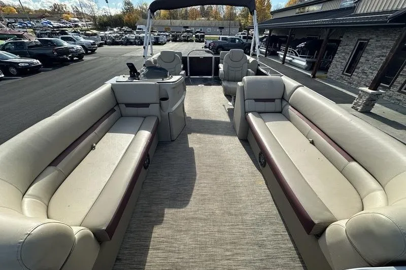 Slide: The Image of 2022 Bennington 2286 pontoon boat interior with spacious seating and modern design. - 18