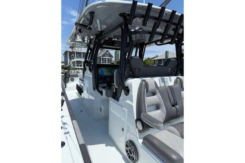 Slide: The Image of 2024 Freeman 38 boat interior with modern seating and navigation equipment. - 4