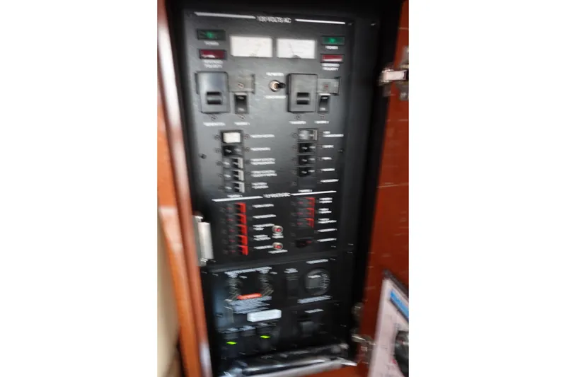 Slide: The Image of Electrical control panel on a 2013 Sea Ray Sundancer 370 yacht. - 30