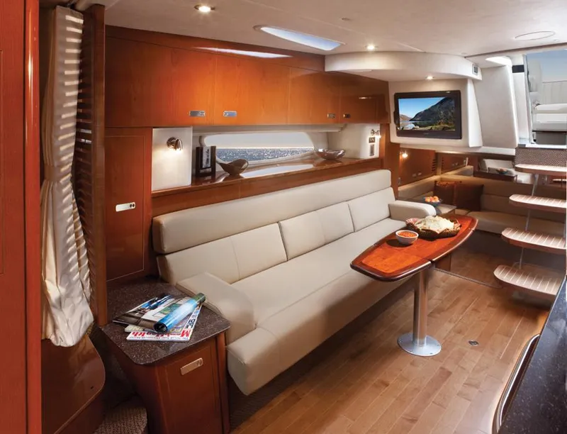 Slide: The Image of Manufacturer Provided Image: Luxurious interior of 2013 Sea Ray 370 Sundancer yacht with modern furnishings. - 20