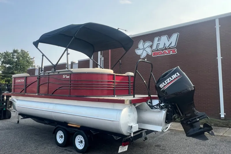 Slide: The Image of 2020 Lexington 521 pontoon boat with Suzuki motor at HM Boats dealership. - 0