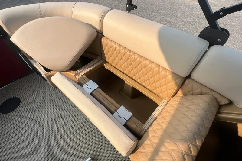 Slide: The Image of Luxurious beige seating with storage on a 2020 Lexington 521 boat. - 14