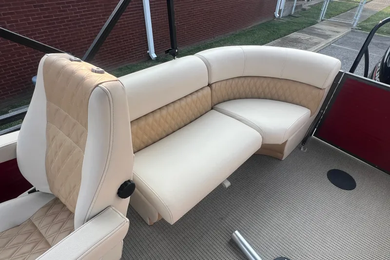 Slide: The Image of Luxurious seating on 2020 Lexington 521 boat with beige upholstery and diamond stitching. - 20