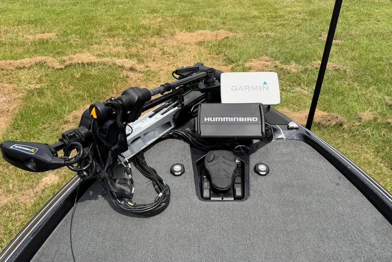 Slide: The Image of 2025 Skeeter FXR21 PRO boat with Garmin and Humminbird electronics on deck. - 3