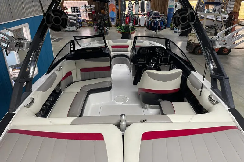 Slide: The Image of Interior view of 2013 Malibu Wakesetter 20 MXZ boat with stylish seating and speakers. - 9