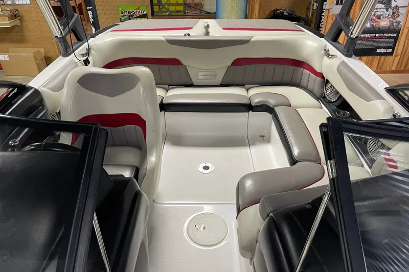 Slide: The Image of Interior of a 2013 Malibu Wakesetter 20 MXZ boat with stylish seating. - 10