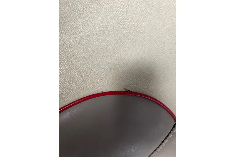 Slide: The Image of Close-up of 2013 Malibu Wakesetter 20 MXZ interior with red trim detail. - 20