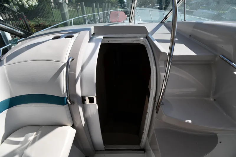 Slide: The Image of Interior view of a 2006 Formula 40 Performance Cruiser, featuring sleek seating and entryway. - 27