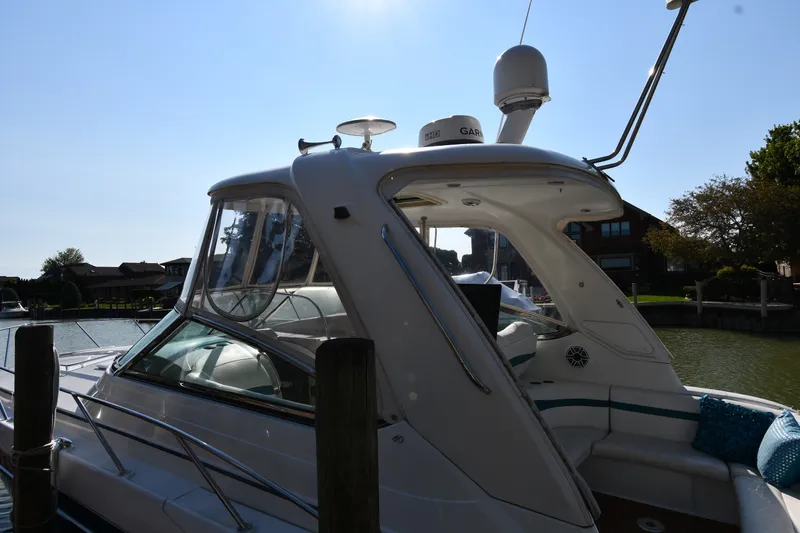 Slide: The Image of 2006 Formula 40 Performance Cruiser docked, showcasing sleek design and modern amenities. - 5