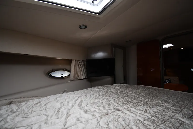 Slide: The Image of Interior of 2006 Formula 40 Performance Cruiser with cozy bed and porthole window. - 33