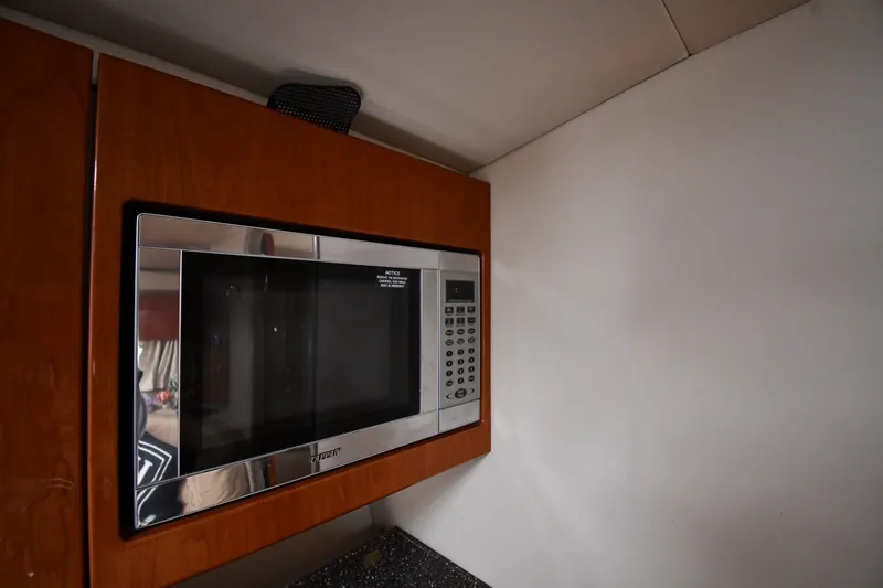 Slide: The Image of Built-in microwave in 2006 Formula 40 Performance Cruiser kitchen area. - 39