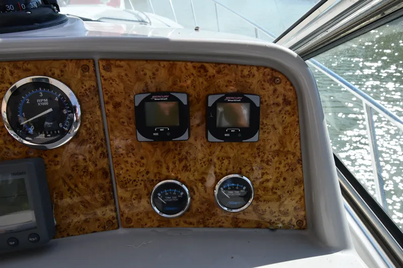 Slide: The Image of Dashboard of a 2006 Formula 40 Performance Cruiser with RPM and Mercury SmartCraft gauges. - 17