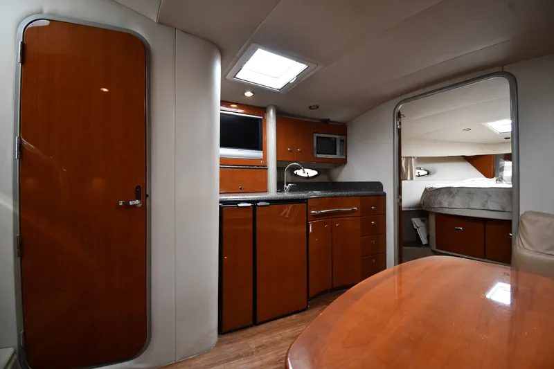 Slide: The Image of Interior of 2006 Formula 40 Performance Cruiser with kitchenette and cozy sleeping area. - 35