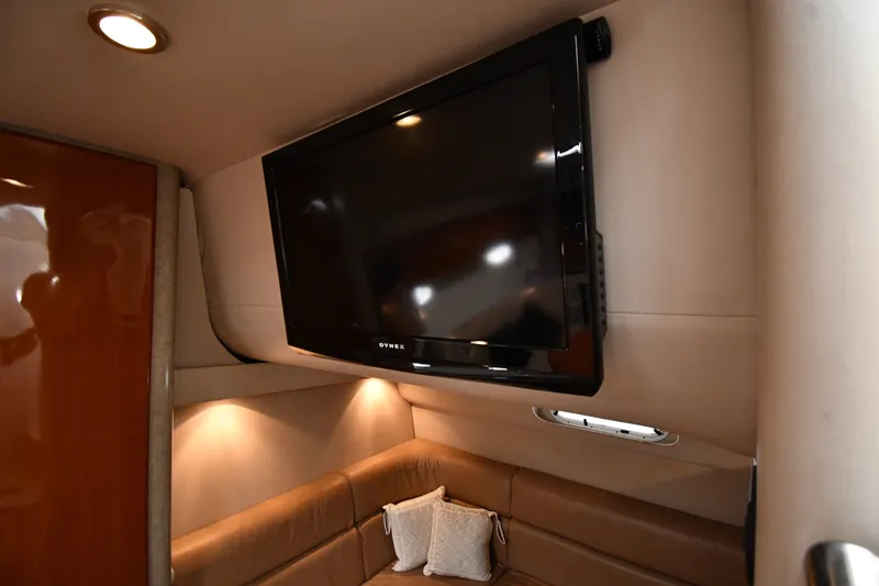 Slide: The Image of Interior of 2006 Formula 40 Performance Cruiser with wall-mounted TV and cozy seating area. - 43