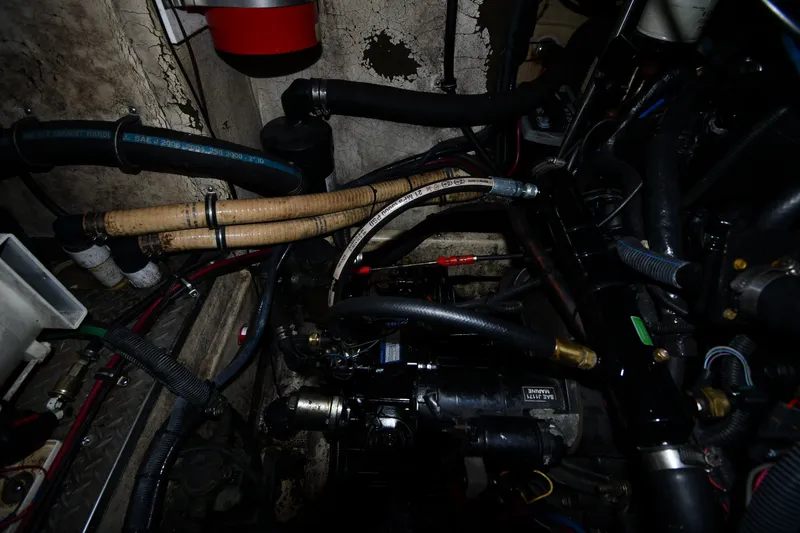 Slide: The Image of Engine compartment of a 2006 Formula 40 Performance Cruiser with hoses and wiring. - 56