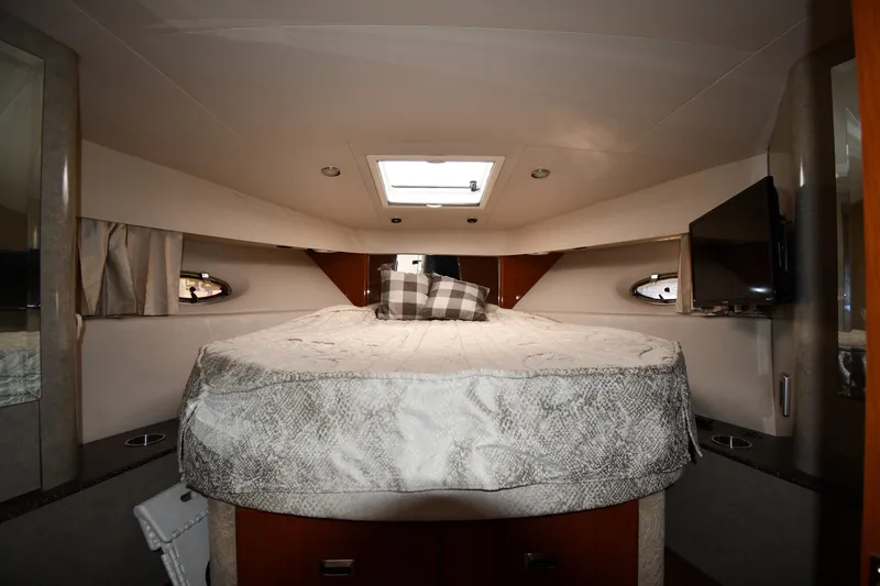 Slide: The Image of Interior cabin of a 2006 Formula 40 Performance Cruiser with bed and TV. - 29