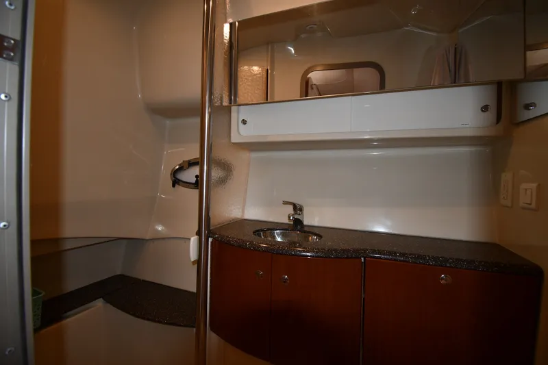Slide: The Image of Interior of 2006 Formula 40 Performance Cruiser bathroom with sink and storage cabinets. - 45