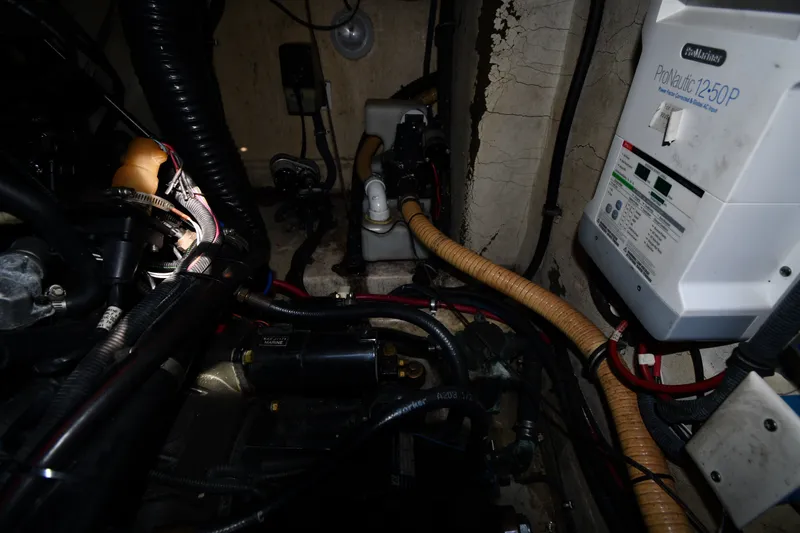 Slide: The Image of Engine compartment of a 2006 Formula 40 Performance Cruiser with ProNautic 12-50P charger. - 55