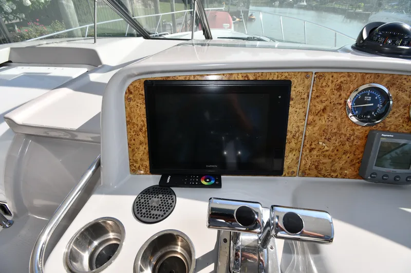 Slide: The Image of Dashboard of a 2006 Formula 40 Performance Cruiser with navigation and control instruments. - 14