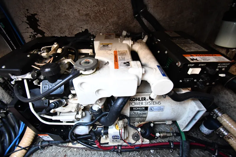 Slide: The Image of Engine compartment of a 2006 Formula 40 Performance Cruiser with Kohler power systems. - 54