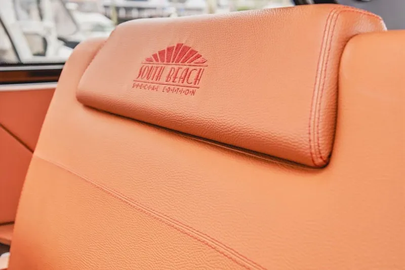 Slide: The Image of Orange leather seat with "South Beach Special Edition" embroidery on 2022 Cruisers Yachts 42 GLS I/O. - 71