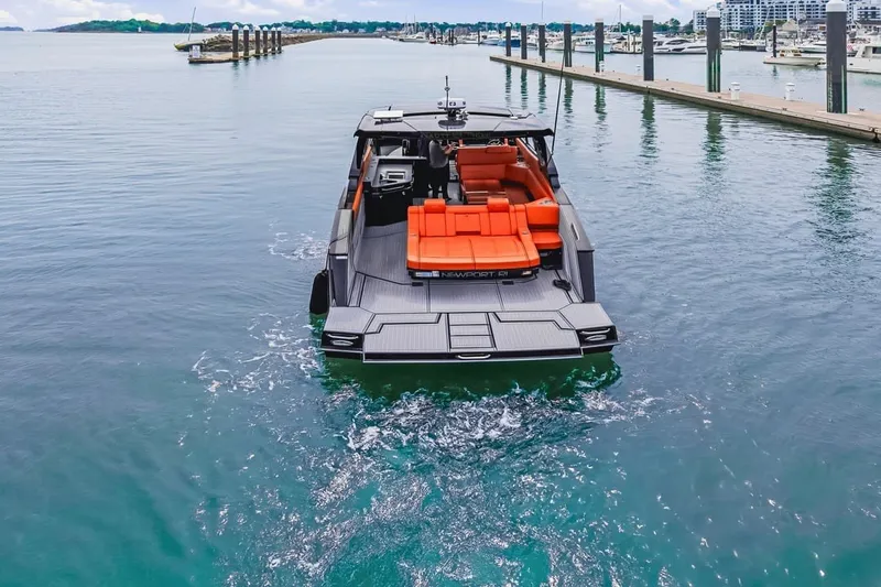 Slide: The Image of 2022 Cruisers Yachts 42 GLS I/O on water, featuring sleek design and vibrant seating. - 7
