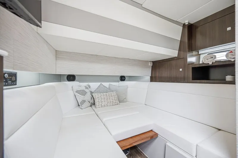 Slide: The Image of Luxurious interior of 2022 Cruisers Yachts 42 GLS I/O with plush seating and modern design. - 69