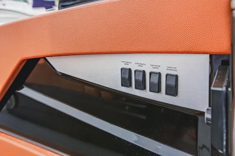 Slide: The Image of Control panel on 2022 Cruisers Yachts 42 GLS I/O with labeled switches. - 72