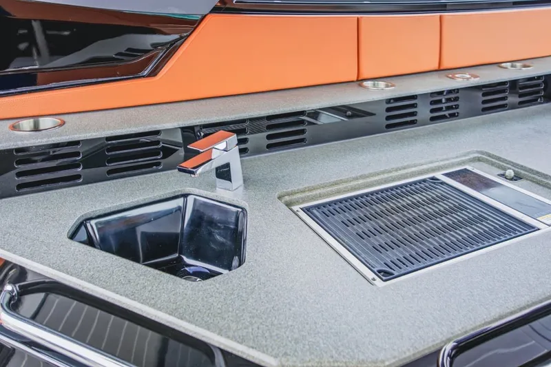 Slide: The Image of Luxury yacht kitchen area with modern sink and grill, 2022 Cruisers Yachts 42 GLS I/O. - 45