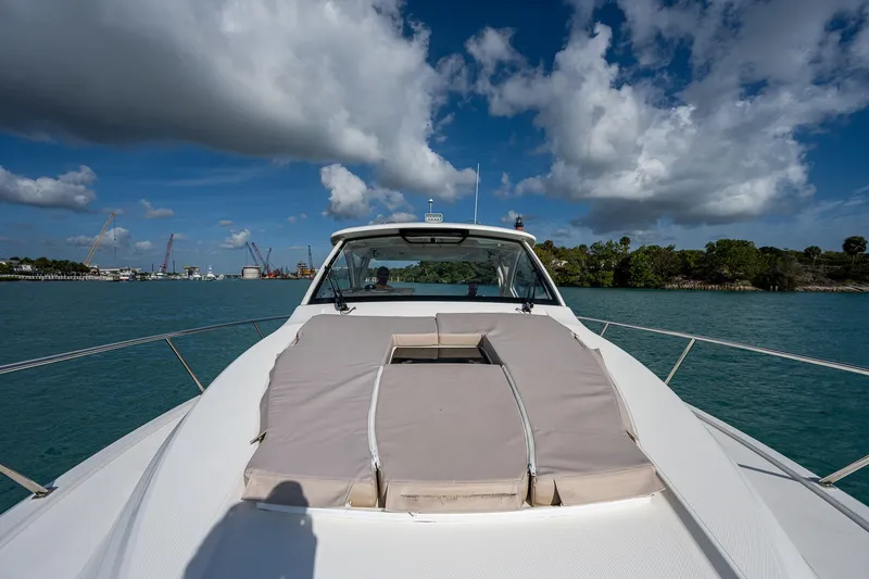 Slide: The Image of 2020 Pursuit OS 355 Offshore yacht cruising on a sunny day with blue skies. - 49