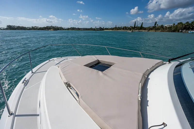 Slide: The Image of 2020 Pursuit OS 355 Offshore boat on calm blue waters under a clear sky. - 50